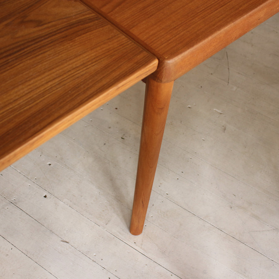 Danish teak dining table by Henning Kjærnulf