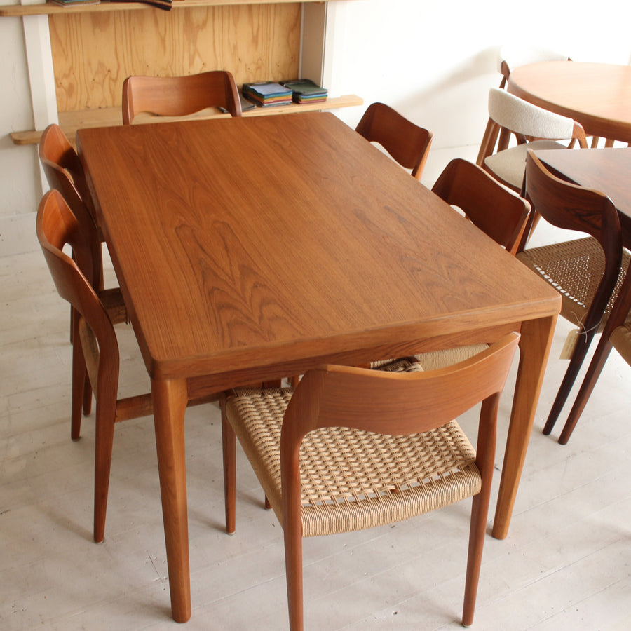 Danish teak dining table by Henning Kjærnulf