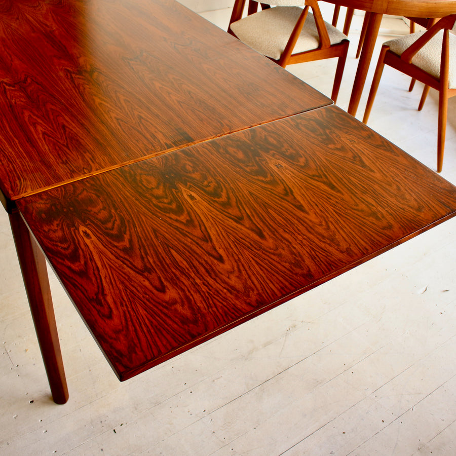 Danish mid century Brazilian rosewood dining table by Henning Kjærnulf