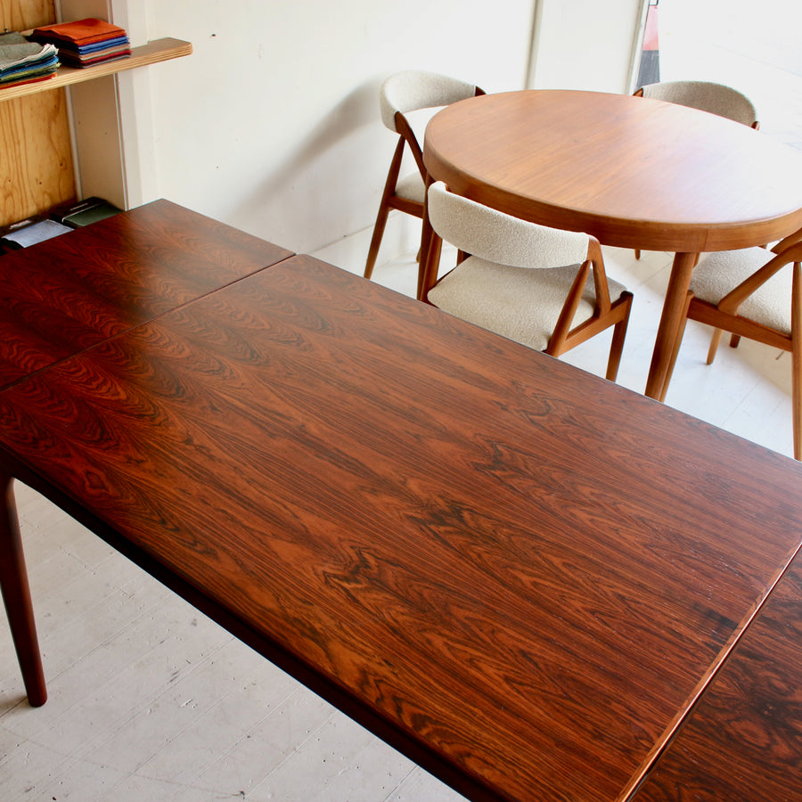 Danish mid century Brazilian rosewood dining table by Henning Kjærnulf