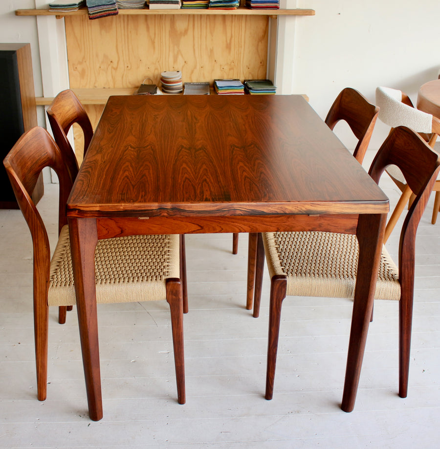 Danish mid century Brazilian rosewood dining table by Henning Kjærnulf