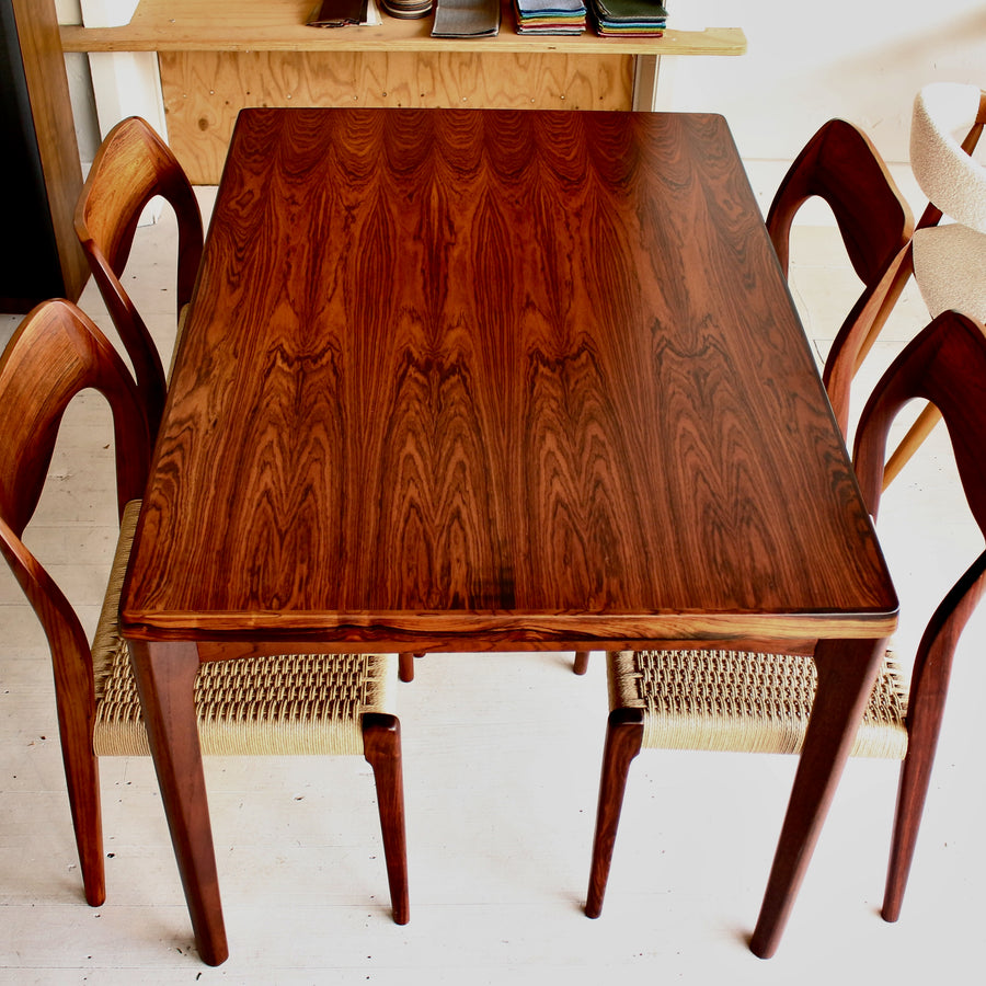 Danish mid century Brazilian rosewood dining table by Henning Kjærnulf