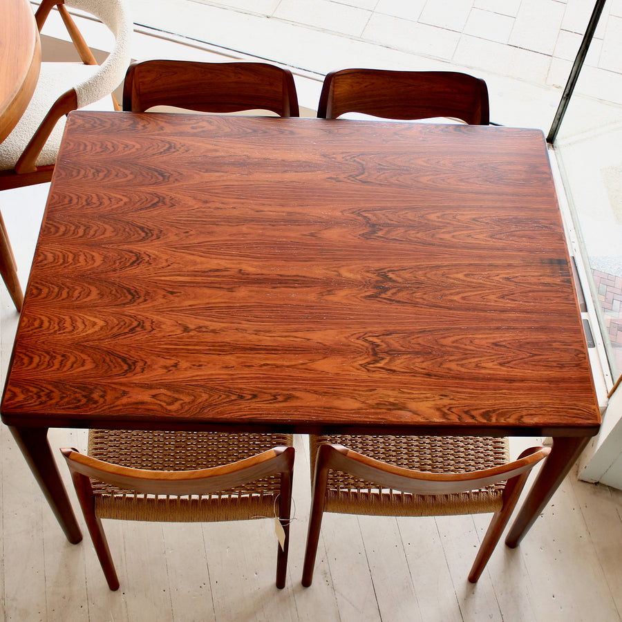 Danish mid century Brazilian rosewood dining table by Henning Kjærnulf